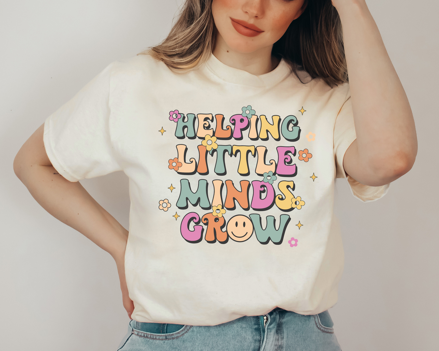 Helping Little Minds Grow Unisex T-Shirt