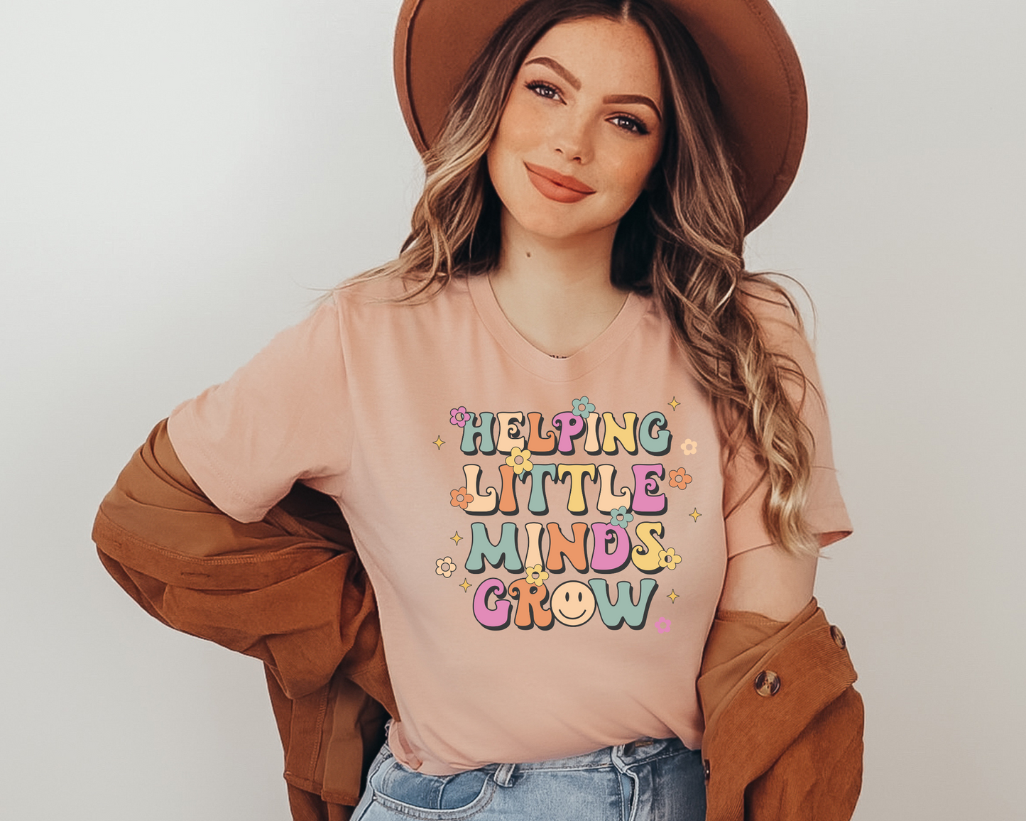 Helping Little Minds Grow Unisex T-Shirt