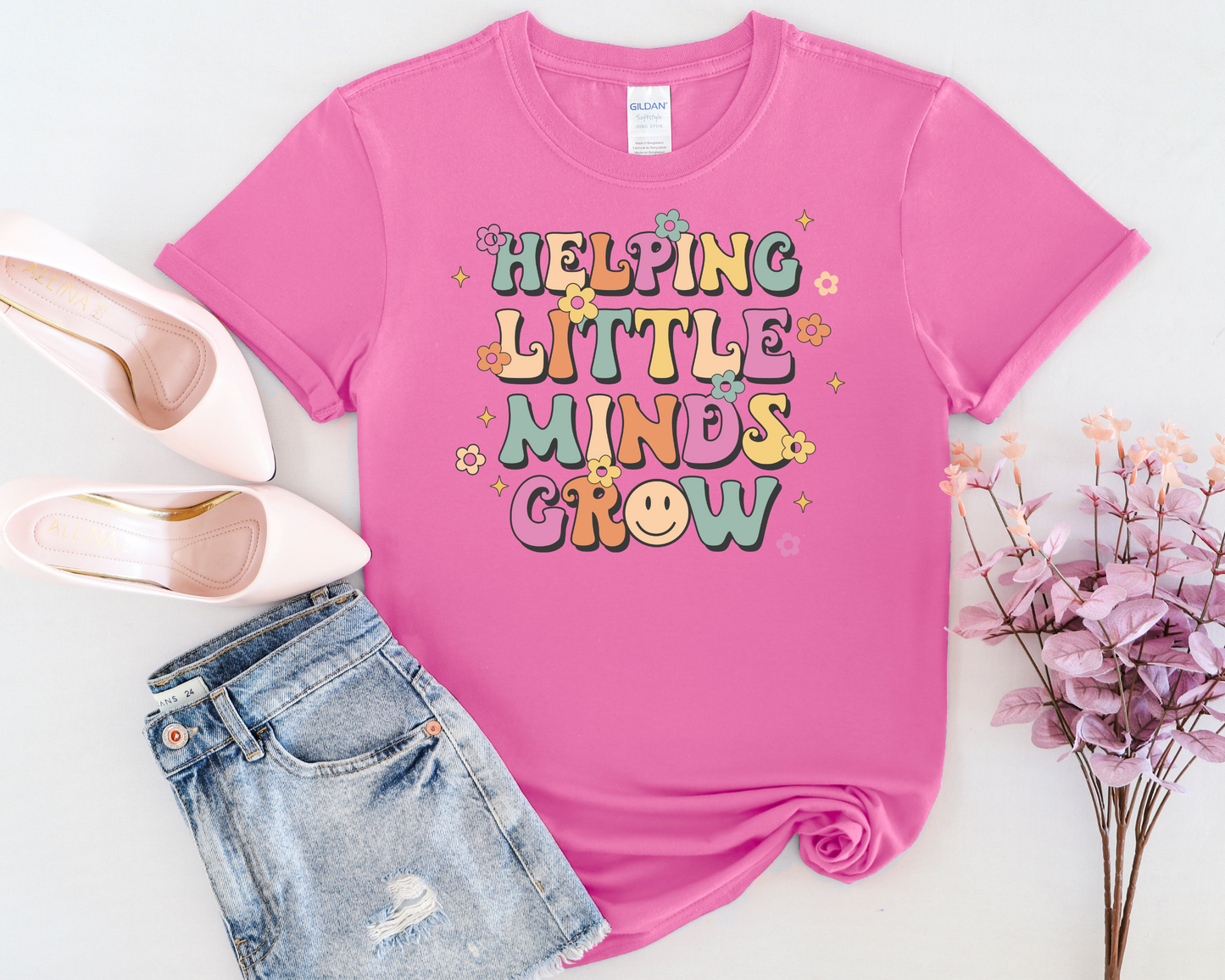 Helping Little Minds Grow Unisex T-Shirt